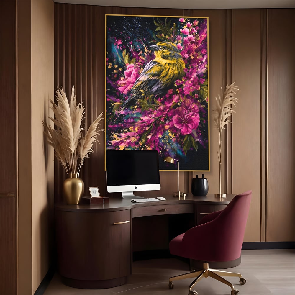 Tablou canvas cu tablou canvas cu pasare printre flori, in rama de aluminiu auriu, pe perete intr-un birou