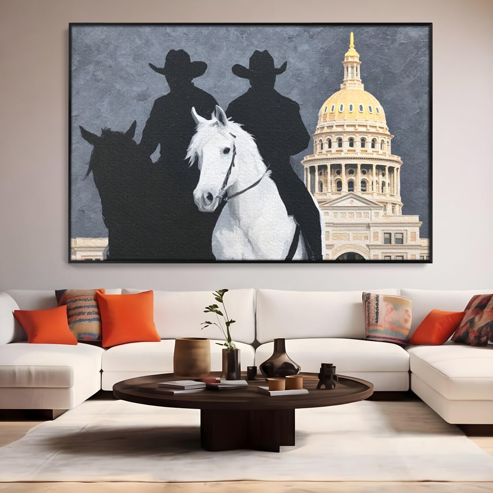 Tablou canvas cu pictura cu doi cowboy si cladire oficiala, in rama de aluminiu negru, pe perete intr-un living