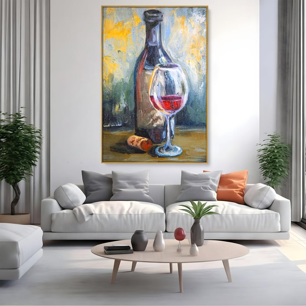 Tablou canvas cu pictura cu sticla de vin si pahar, in rama de aluminiu auriu, pe perete intr-un living