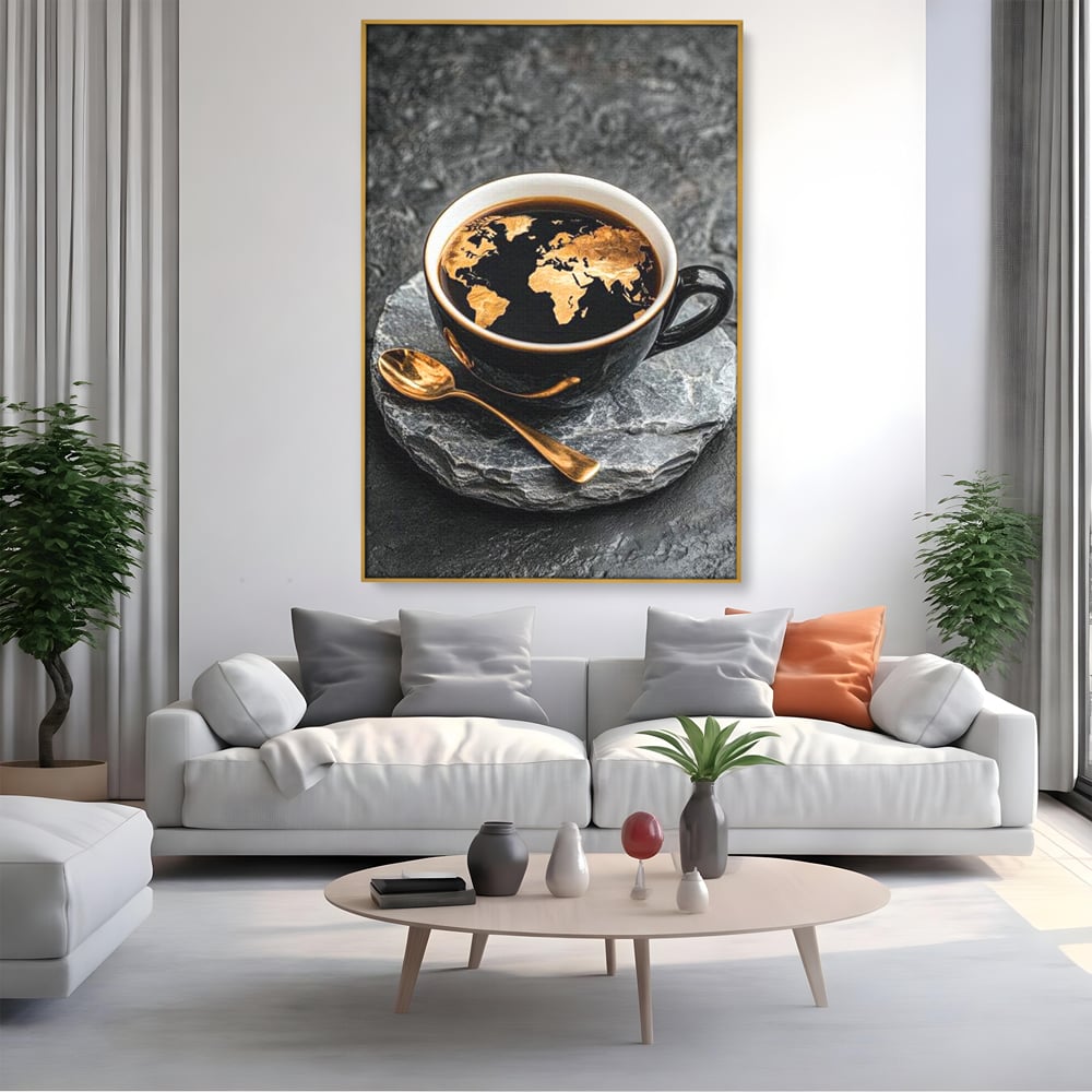 Tablou canvas cu tablou canvas cu ceasca de cafea si harta lumii, in rama de aluminiu auriu, pe perete intr-un living