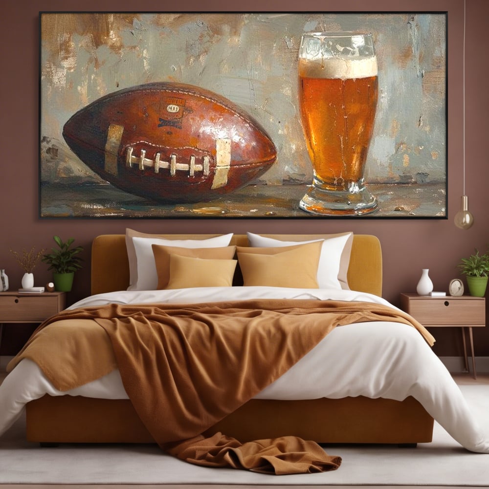 Tablou canvas cu pictura cu minge de fotbal si pahar de bere, in rama de aluminiu negru, pe perete intr-un dormitor