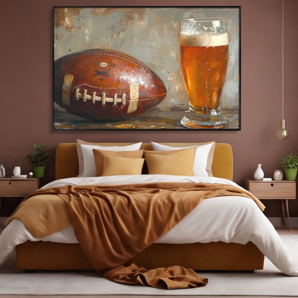 Tablou canvas cu pictura cu minge de fotbal si pahar de bere, in rama de aluminiu negru, pe perete intr-un dormitor