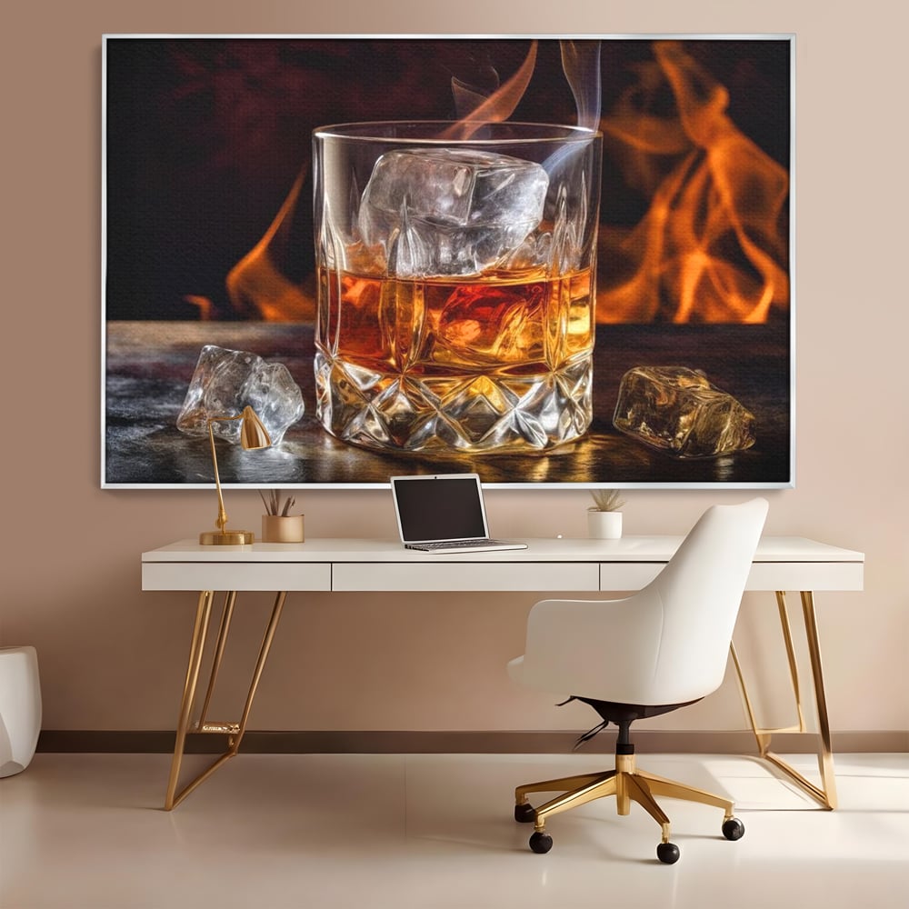 Tablou canvas cu tablou canvas cu pahar de whisky si foc, in rama de aluminiu argintiu, pe perete intr-un birou