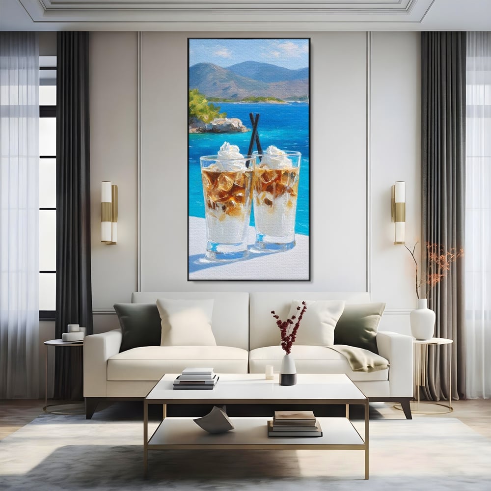 Tablou canvas cu pictura cu doua pahare de frappe pe malul marii, in rama de aluminiu negru, pe perete intr-un living