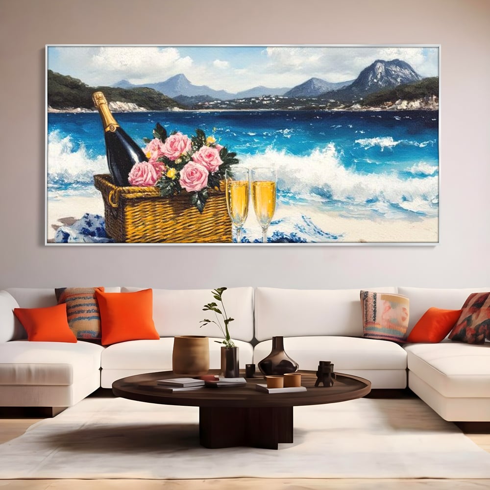 Tablou canvas cu pictura cu picnic pe plaja cu sampanie, in rama de aluminiu argintiu, pe perete intr-un living