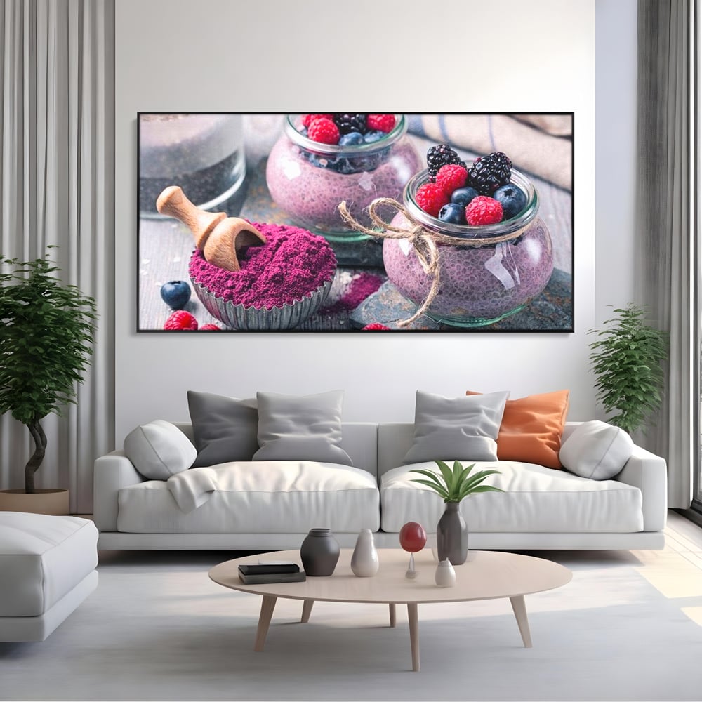 Tablou canvas cu natura moarta cu desert si fructe de padure, in rama de aluminiu negru, pe perete intr-un living