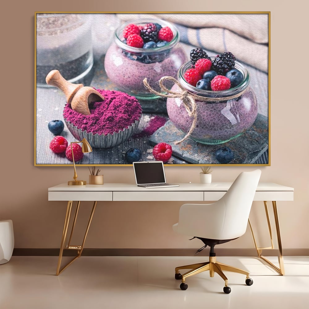 Tablou canvas cu natura moarta cu desert si fructe de padure, in rama de aluminiu auriu, pe perete intr-un birou