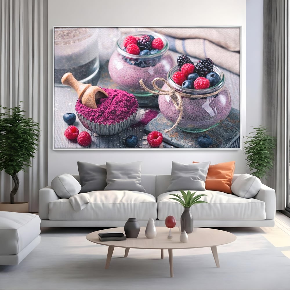 Tablou canvas cu natura moarta cu desert si fructe de padure, in rama de aluminiu argintiu, pe perete intr-un living