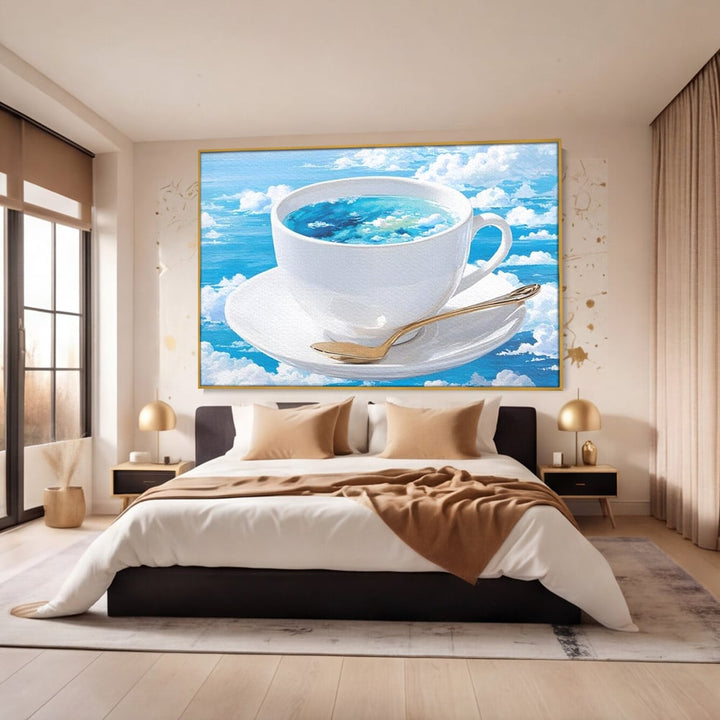 Tablou canvas cu tablou canvas cu ceasca de cafea si cer senin, in rama de aluminiu auriu, pe perete intr-un dormitor