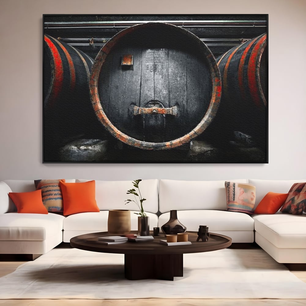 Tablou canvas cu butoaie de lemn din crama, in rama de aluminiu negru, pe perete intr-un living
