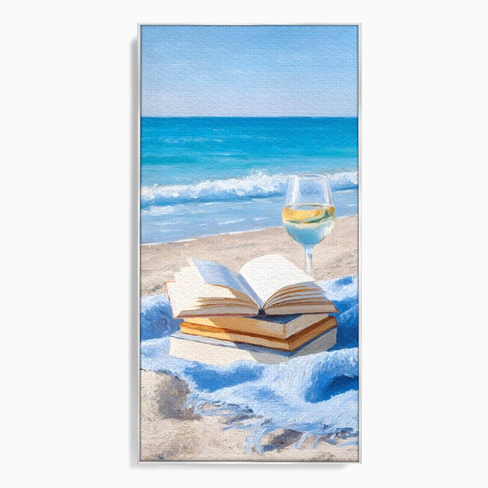 Tablou canvas cu pictura cu carti si pahar de vin pe plaja, in rama de aluminiu argintiu