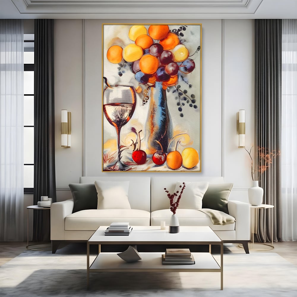 Tablou canvas cu tablou cu sticla, pahar de vin si fructe, in rama de aluminiu auriu, pe perete intr-un living