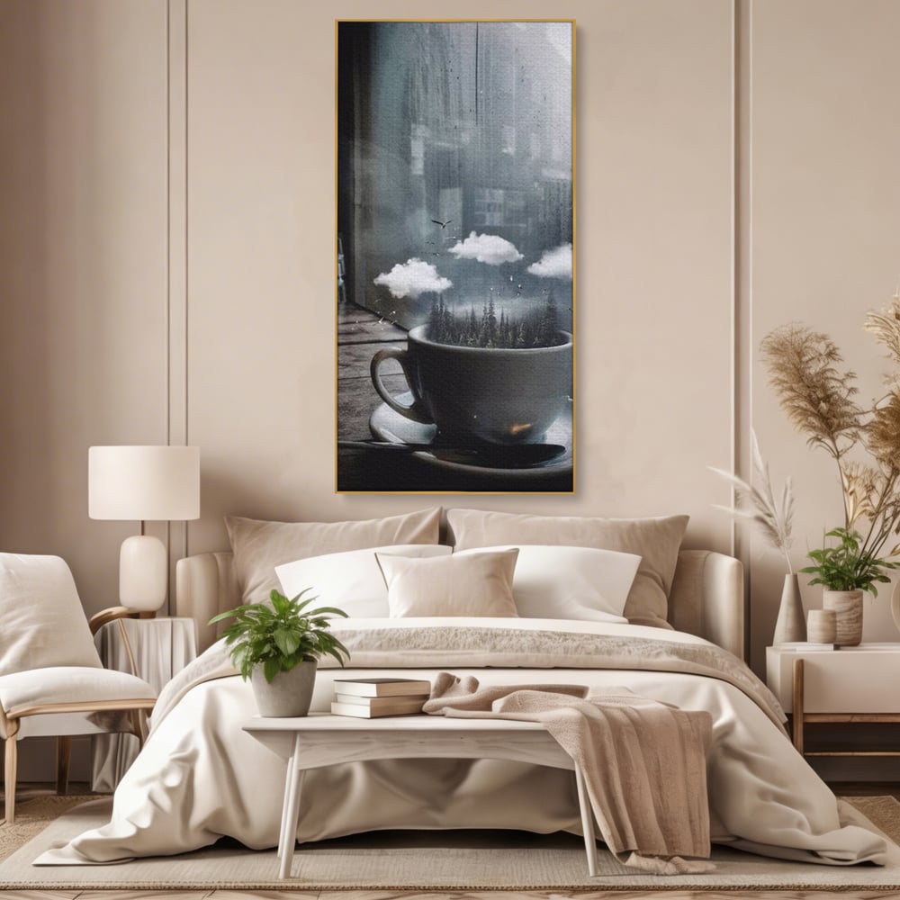 Tablou canvas cu ceasca de cafea cu padure si nori, in rama de aluminiu auriu, pe perete intr-un dormitor