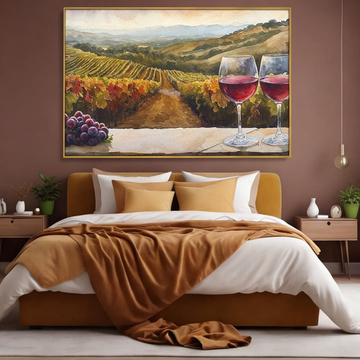Tablou canvas cu tablou canvas cu peisaj viticol si pahare de vin, in rama de aluminiu auriu, pe perete intr-un dormitor