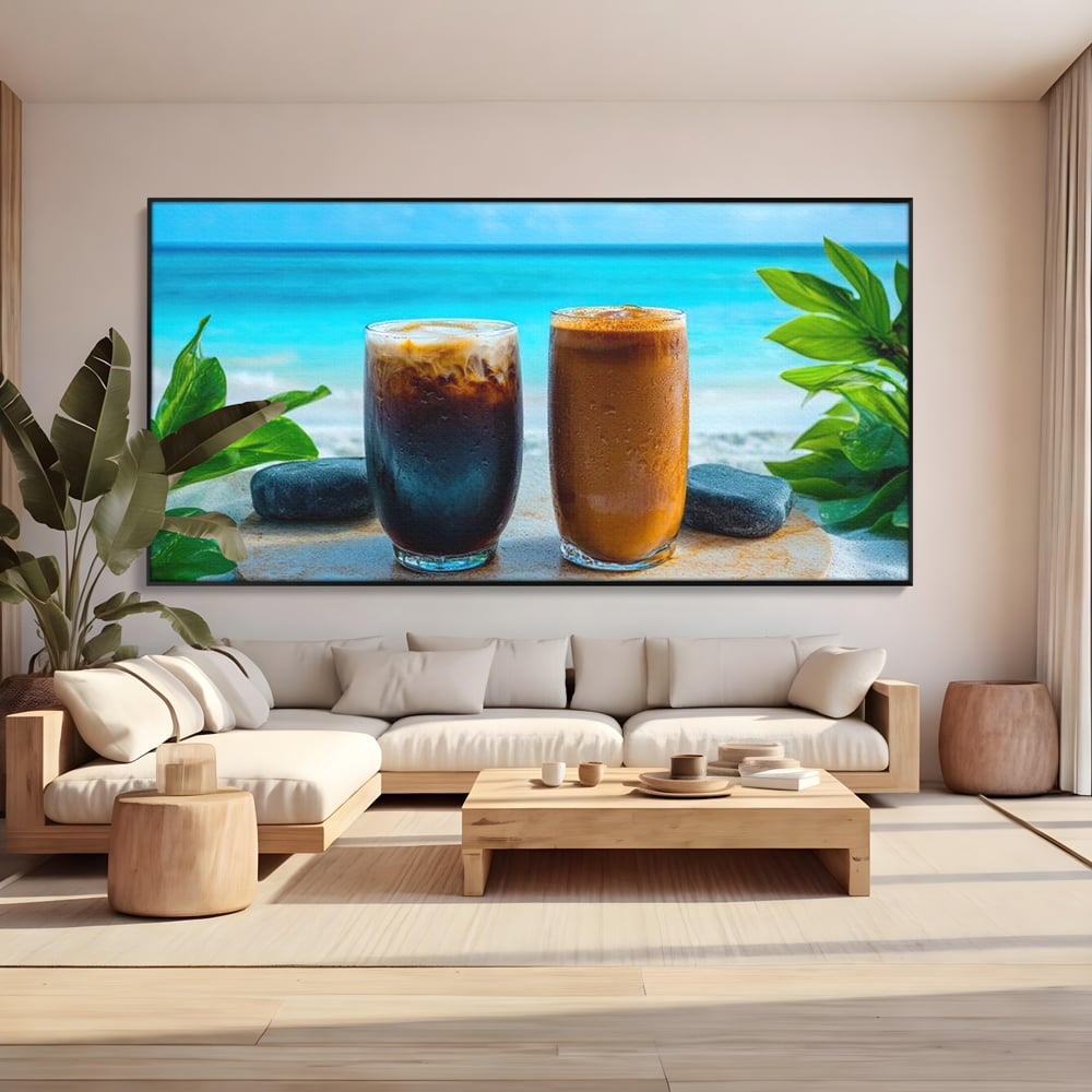 Tablou canvas cu doua pahare cu cafea pe plaja, in rama de aluminiu negru, pe perete intr-un living