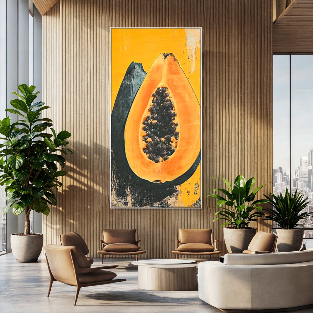 Tablou canvas cu tablou canvas cu papaya taiata, in rama de aluminiu argintiu, pe perete intr-un birou