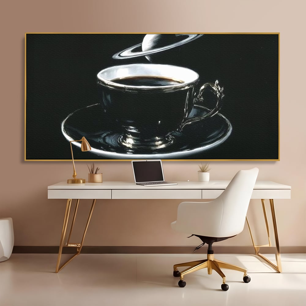 Tablou canvas cu tablou canvas cu ceasca de cafea si planeta, in rama de aluminiu auriu, pe perete intr-un birou