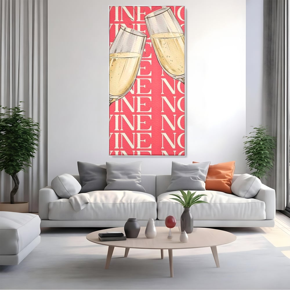 Tablou canvas cu doua pahare cu sampanie si text roz, in rama de aluminiu argintiu, pe perete intr-un living
