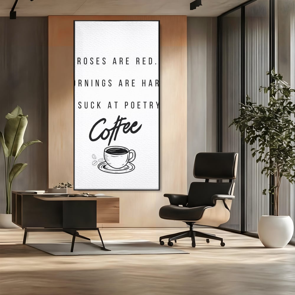Tablou canvas cu tablou canvas cu text humoristic despre cafea, in rama de aluminiu negru, pe perete intr-un birou