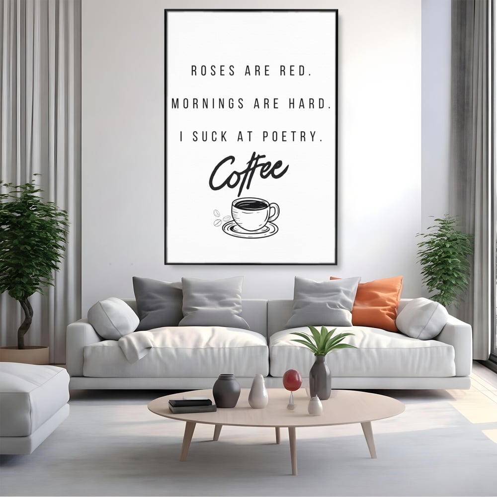 Tablou canvas cu tablou canvas cu text humoristic despre cafea, in rama de aluminiu negru, pe perete intr-un living