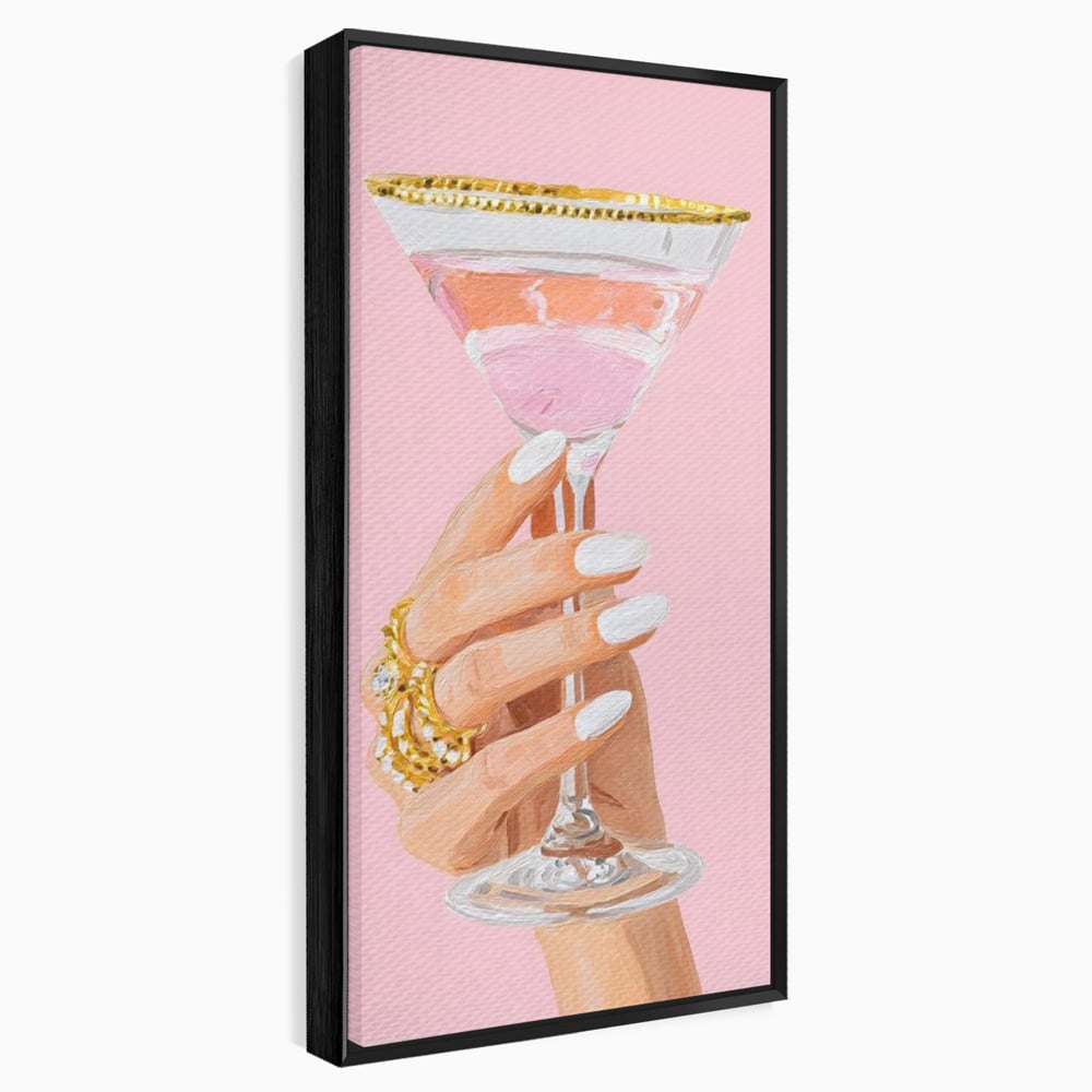 Tablou canvas cu ilustratie cu mana care tine pahar de cocktail, in rama de aluminiu negru
