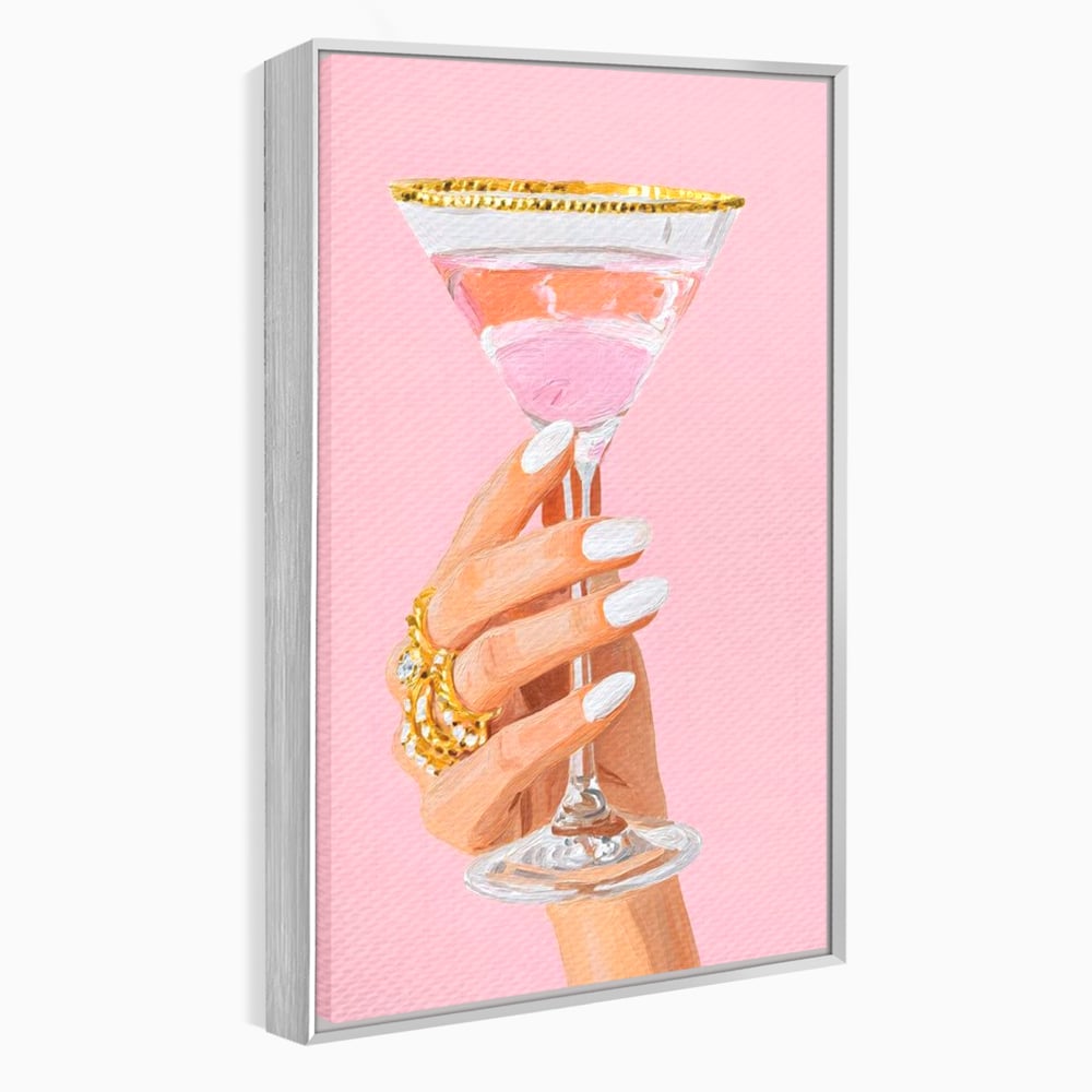 Tablou canvas cu ilustratie cu mana care tine pahar de cocktail, in rama de aluminiu argintiu