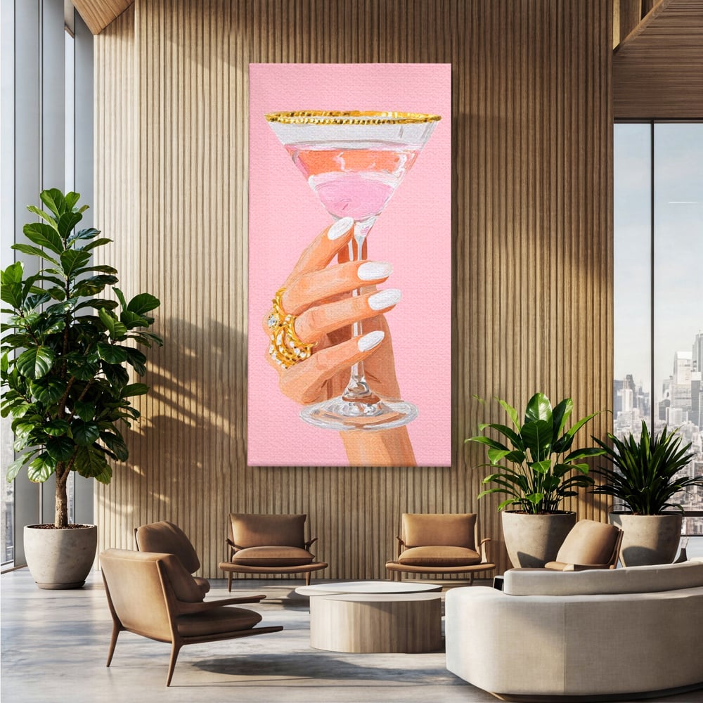 Tablou canvas cu ilustratie cu mana care tine pahar de cocktail, fara rama, pe sasiu de lemn, pe perete intr-un birou