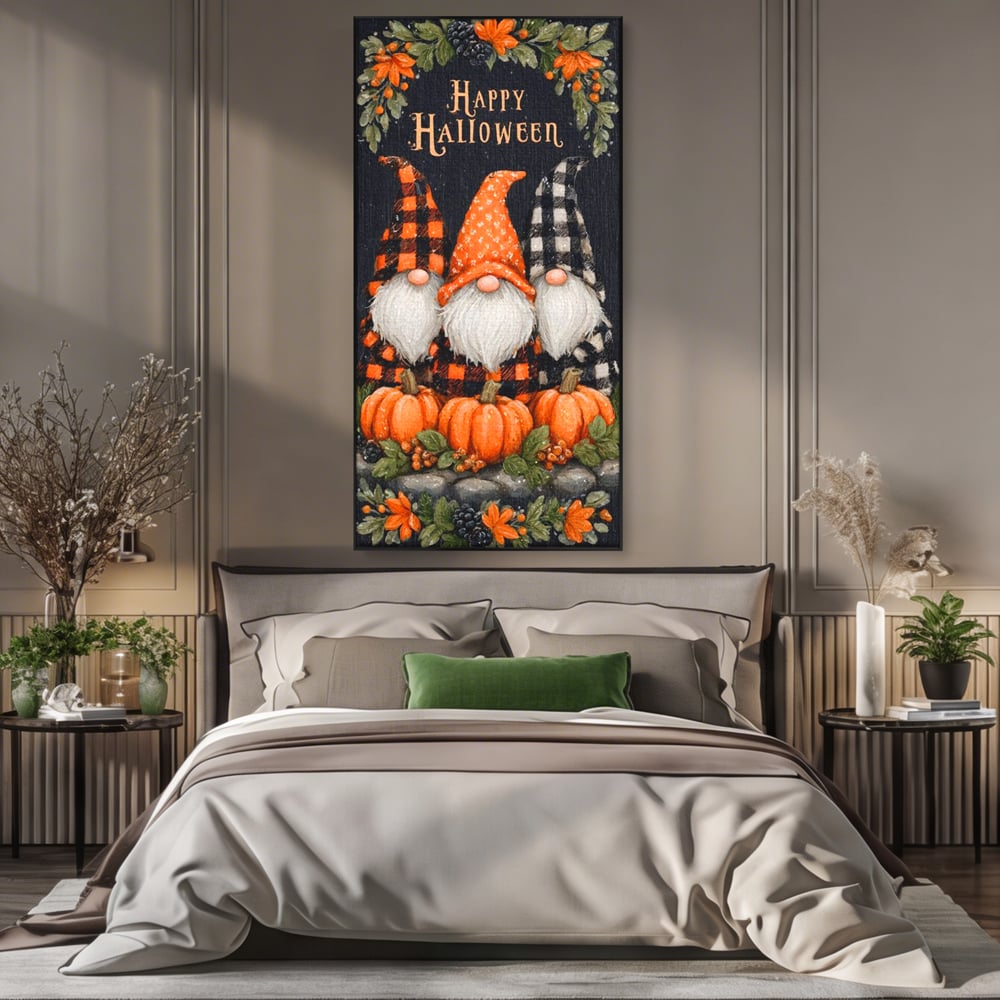 Tablou canvas cu ilustratie cu trei gnomi de halloween, in rama de aluminiu negru, pe perete intr-un dormitor