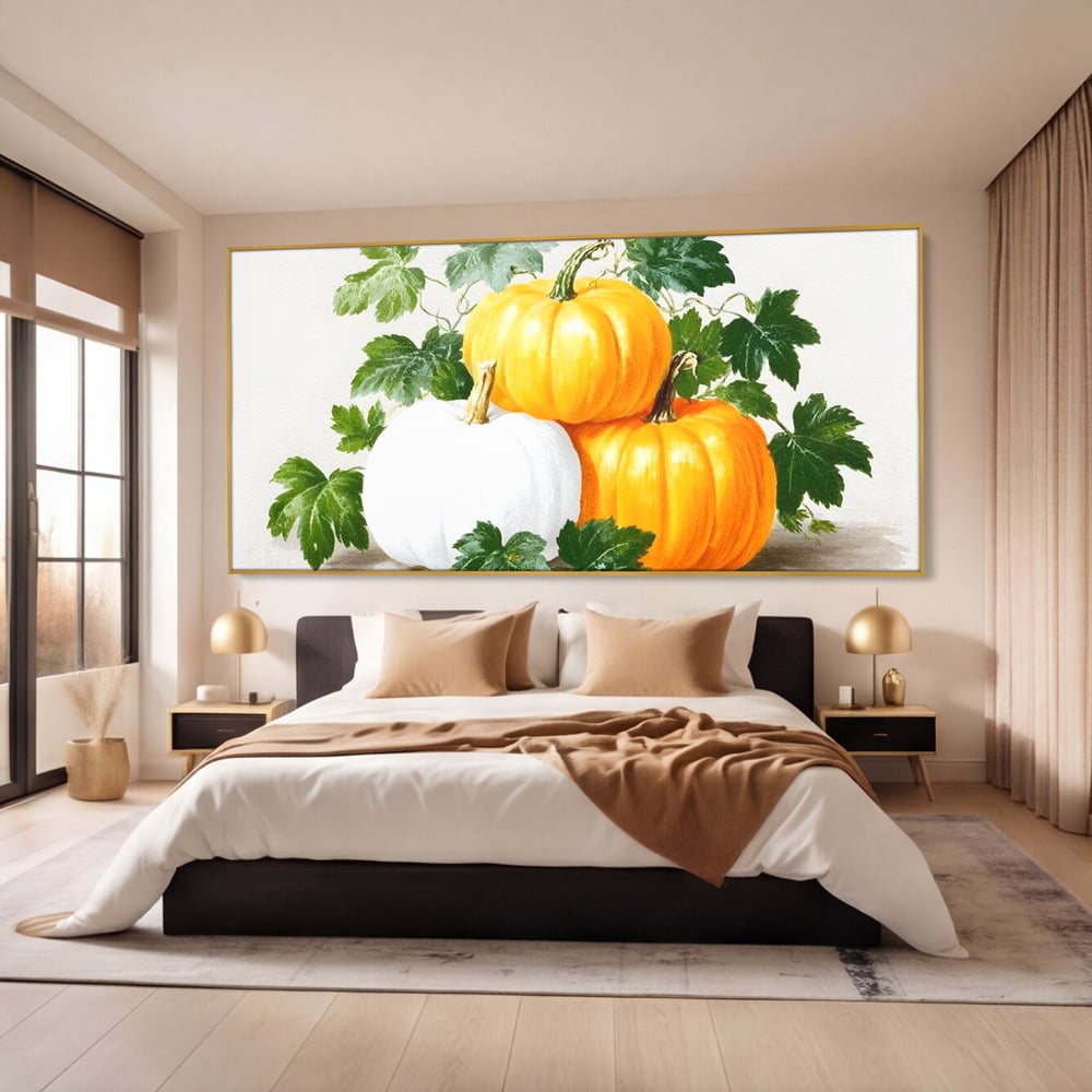 Tablou canvas cu pictura decorativa cu trei dovleci, in rama de aluminiu auriu, pe perete intr-un dormitor