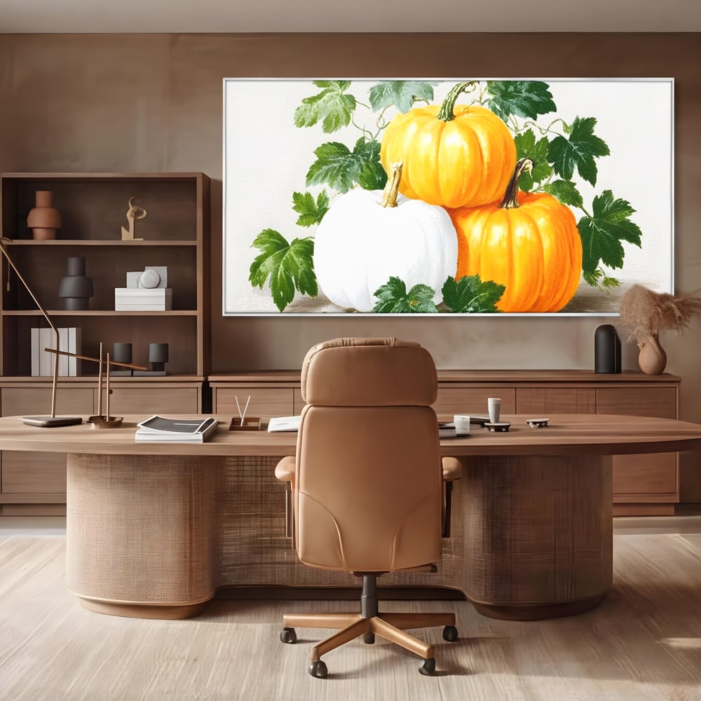 Tablou canvas cu pictura decorativa cu trei dovleci, in rama de aluminiu argintiu, pe perete intr-un birou