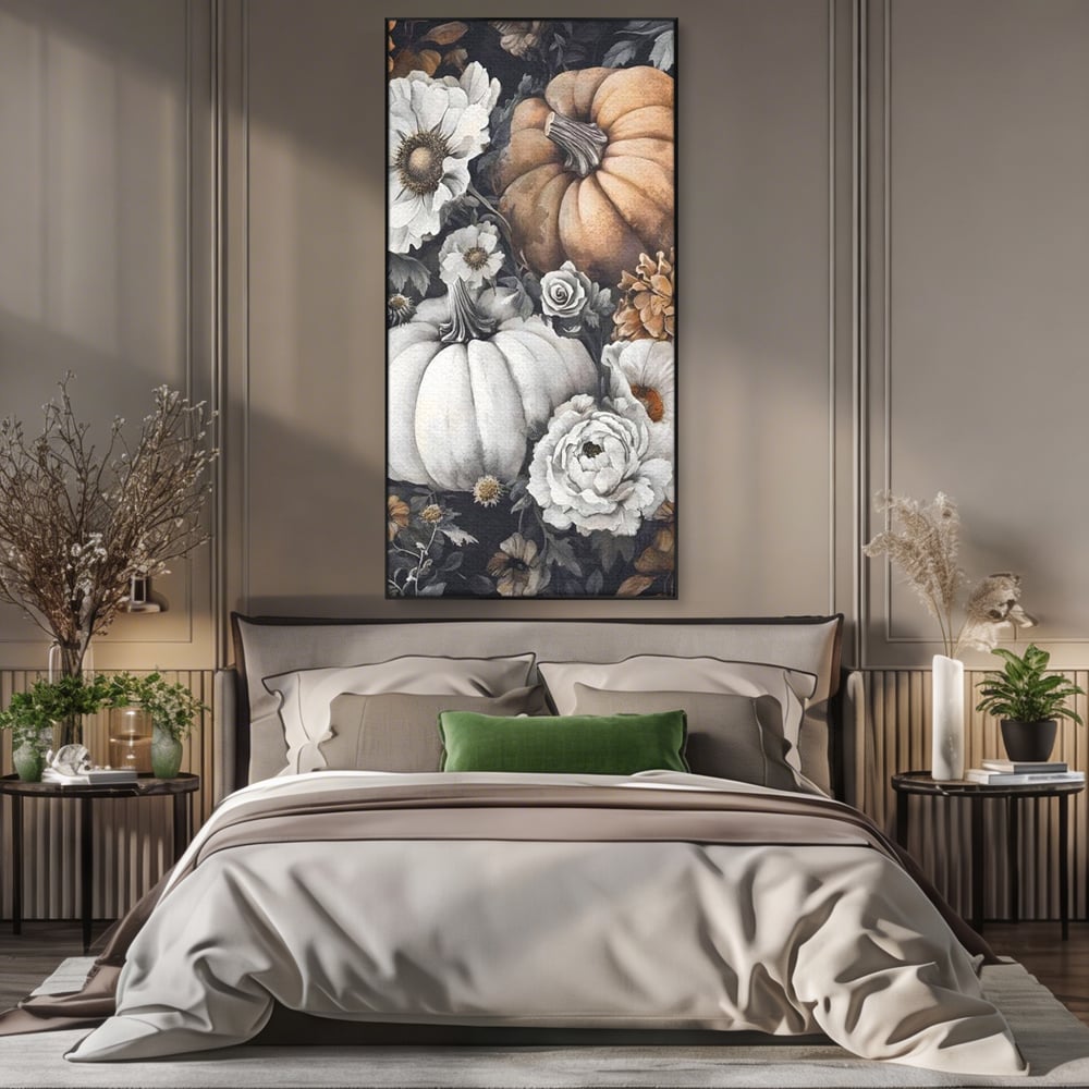 Tablou canvas cu ilustratie cu dovleci si flori de toamna, in rama de aluminiu negru, pe perete intr-un dormitor