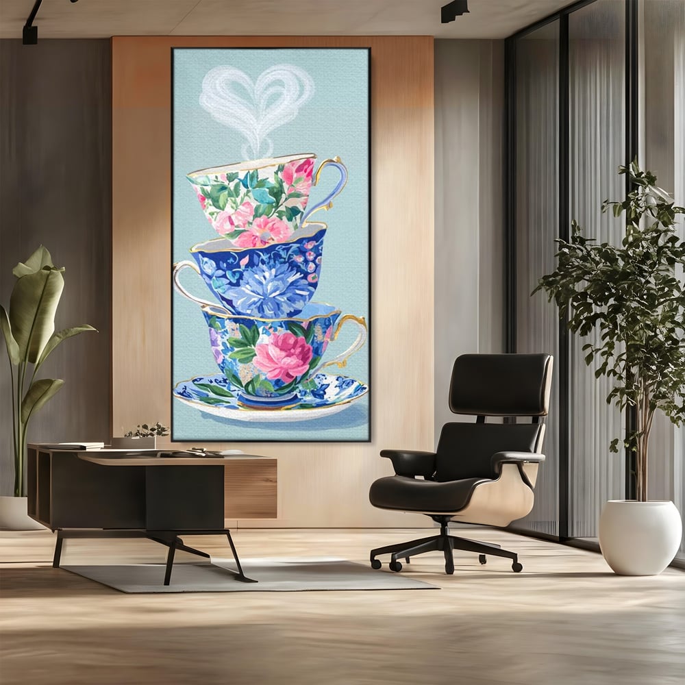 Tablou canvas cu pictura cu stiva de cesti de ceai, in rama de aluminiu negru, pe perete intr-un birou