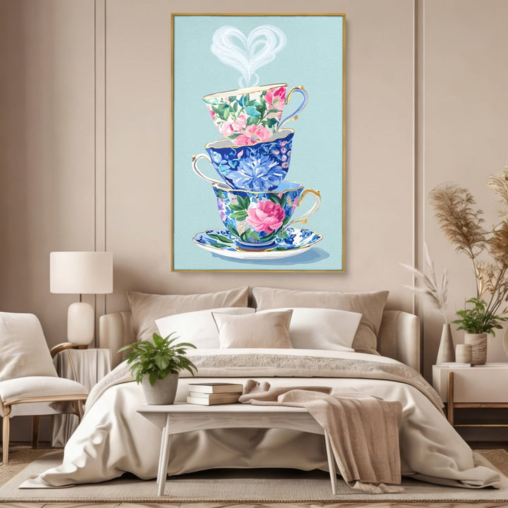Tablou canvas cu pictura cu stiva de cesti de ceai, in rama de aluminiu auriu, pe perete intr-un dormitor