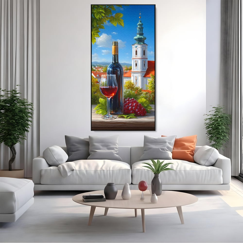 Tablou canvas cu pictura cu sticla de vin si manastire, in rama de aluminiu negru, pe perete intr-un living