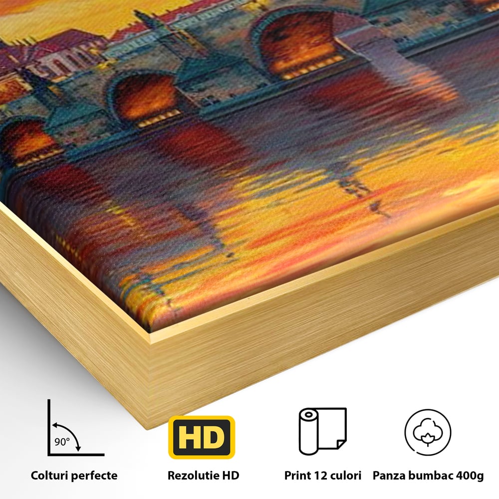 Detaliu al suprafetei: tablou canvas cu apus de asfintit peste praga, in rama de aluminiu auriu
