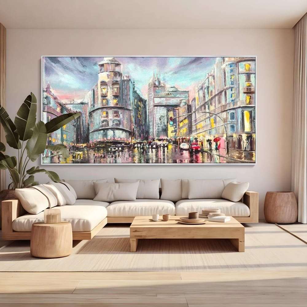 Tablou canvas cu pictura urbana cu strada ploioasa, in rama de aluminiu argintiu, pe perete intr-un living
