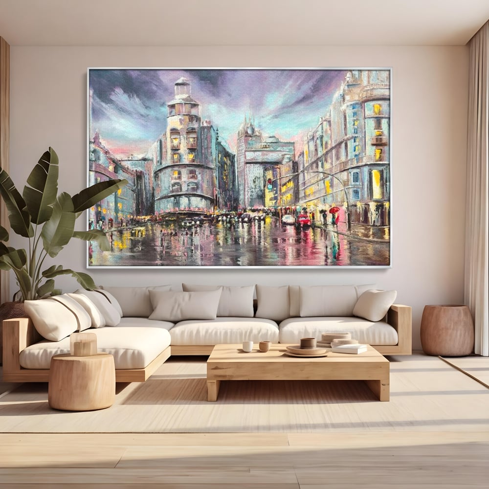 Tablou canvas cu pictura urbana cu strada ploioasa, in rama de aluminiu argintiu, pe perete intr-un living