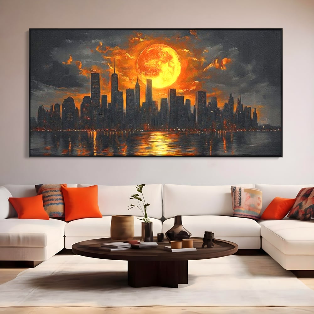 Tablou canvas cu tablou canvas cu apus de soare deasupra metropolei, in rama de aluminiu negru, pe perete intr-un living