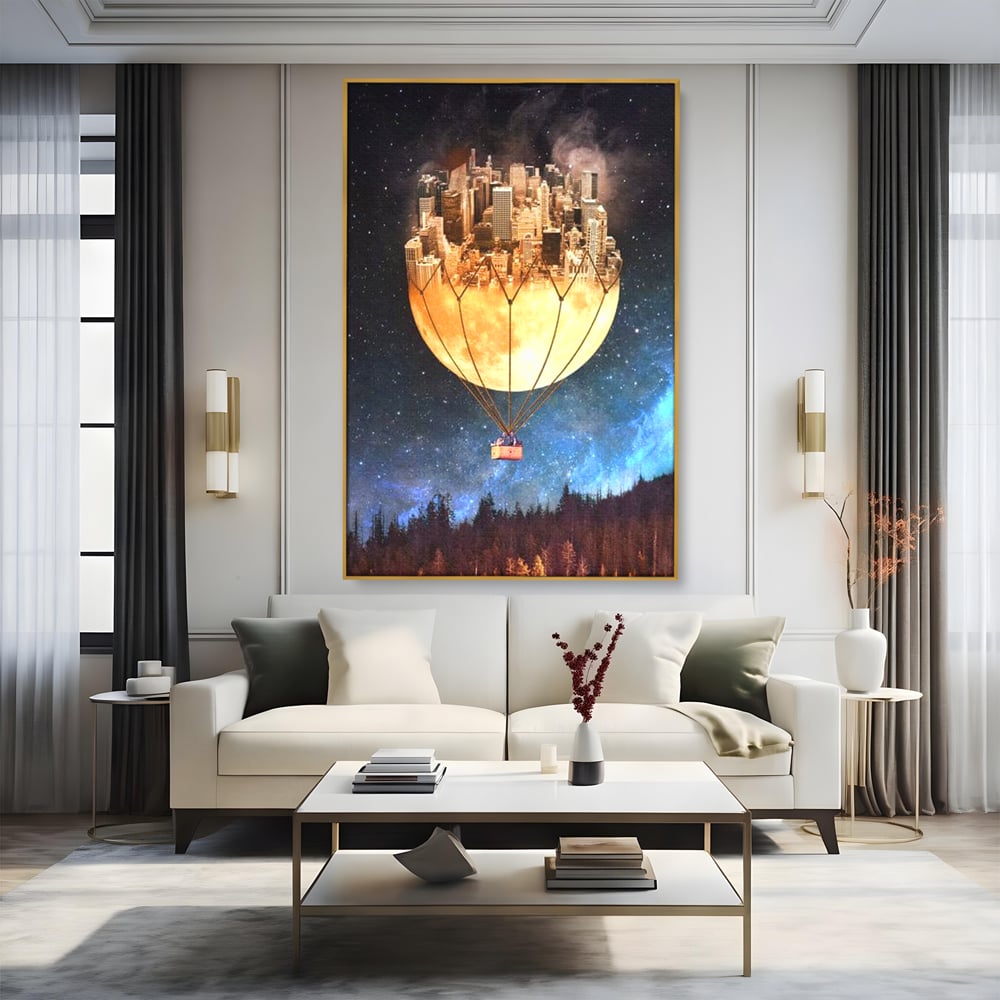 Tablou canvas cu ilustratie cu oras pe luna balon, in rama de aluminiu auriu, pe perete intr-un living