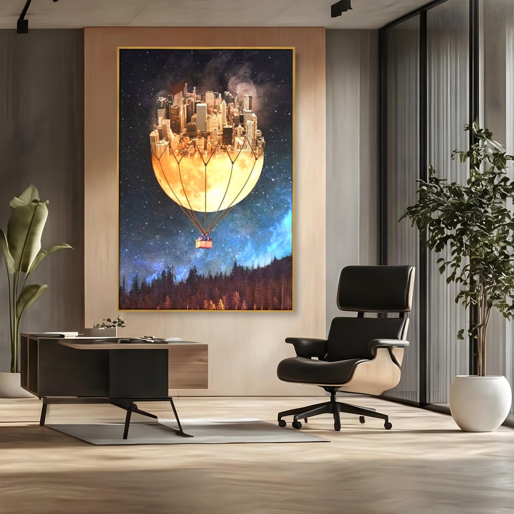 Tablou canvas cu ilustratie cu oras pe luna balon, in rama de aluminiu auriu, pe perete intr-un birou
