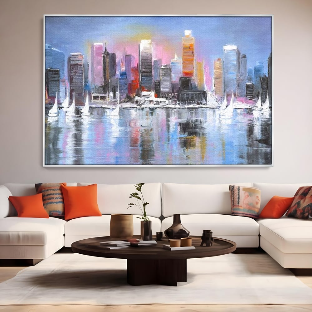 Tablou canvas cu pictura peisaj urban cu vele pe apa, in rama de aluminiu argintiu, pe perete intr-un living