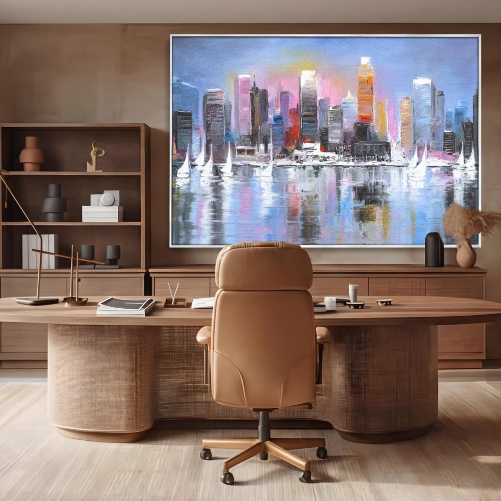 Tablou canvas cu pictura peisaj urban cu vele pe apa, in rama de aluminiu argintiu, pe perete intr-un birou
