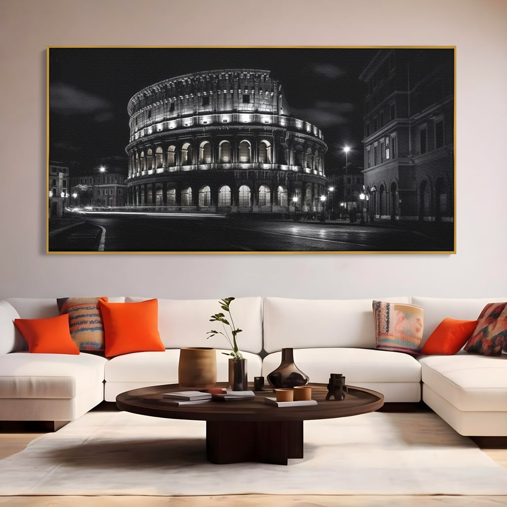 Tablou canvas cu tablou canvas cu colosseumul noaptea, in rama de aluminiu auriu, pe perete intr-un living