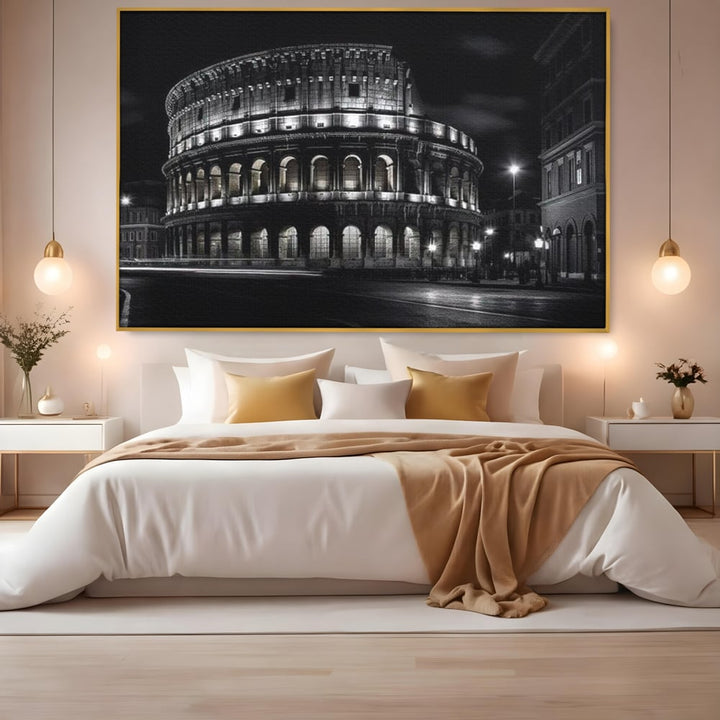 Tablou canvas cu tablou canvas cu colosseumul noaptea, in rama de aluminiu auriu, pe perete intr-un dormitor
