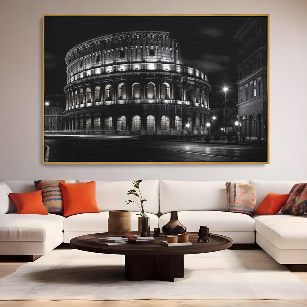 Tablou canvas cu tablou canvas cu colosseumul noaptea, in rama de aluminiu auriu, pe perete intr-un living