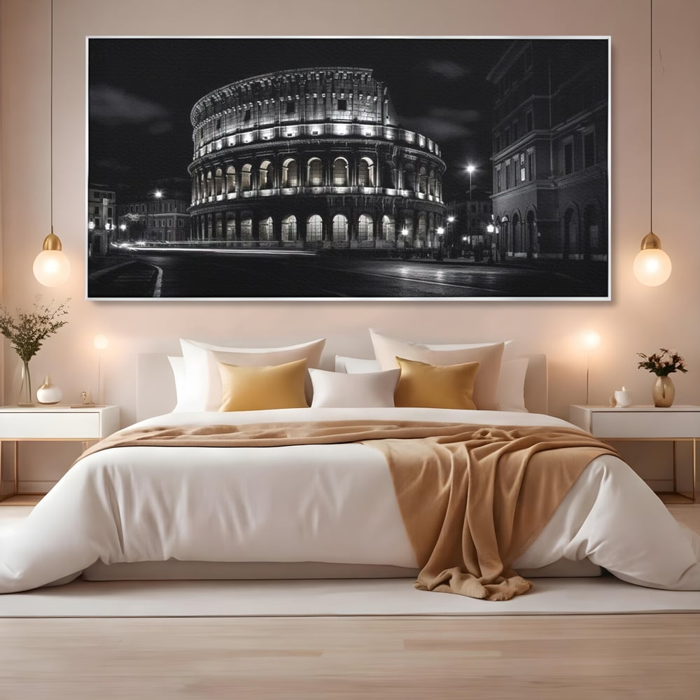 Tablou canvas cu tablou canvas cu colosseumul noaptea, in rama de aluminiu argintiu, pe perete intr-un dormitor