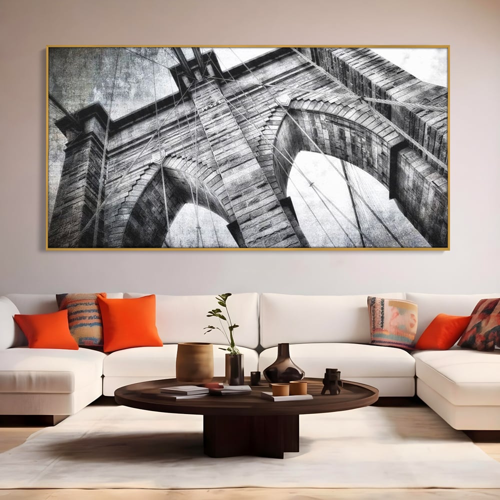 Tablou canvas cu tablou canvas cu podul brooklyn, in rama de aluminiu auriu, pe perete intr-un living