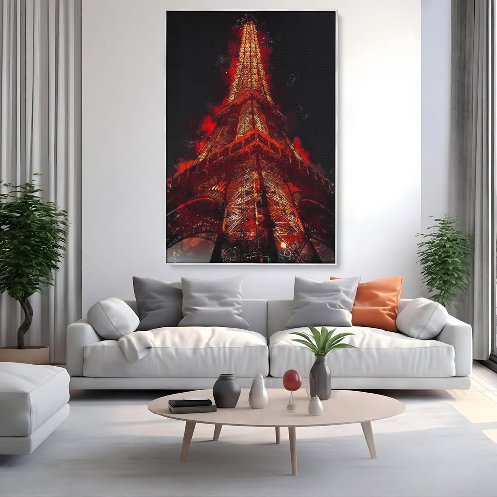 Tablou canvas cu tablou canvas cu turnul eiffel in nuante de rosu, in rama de aluminiu argintiu, pe perete intr-un living
