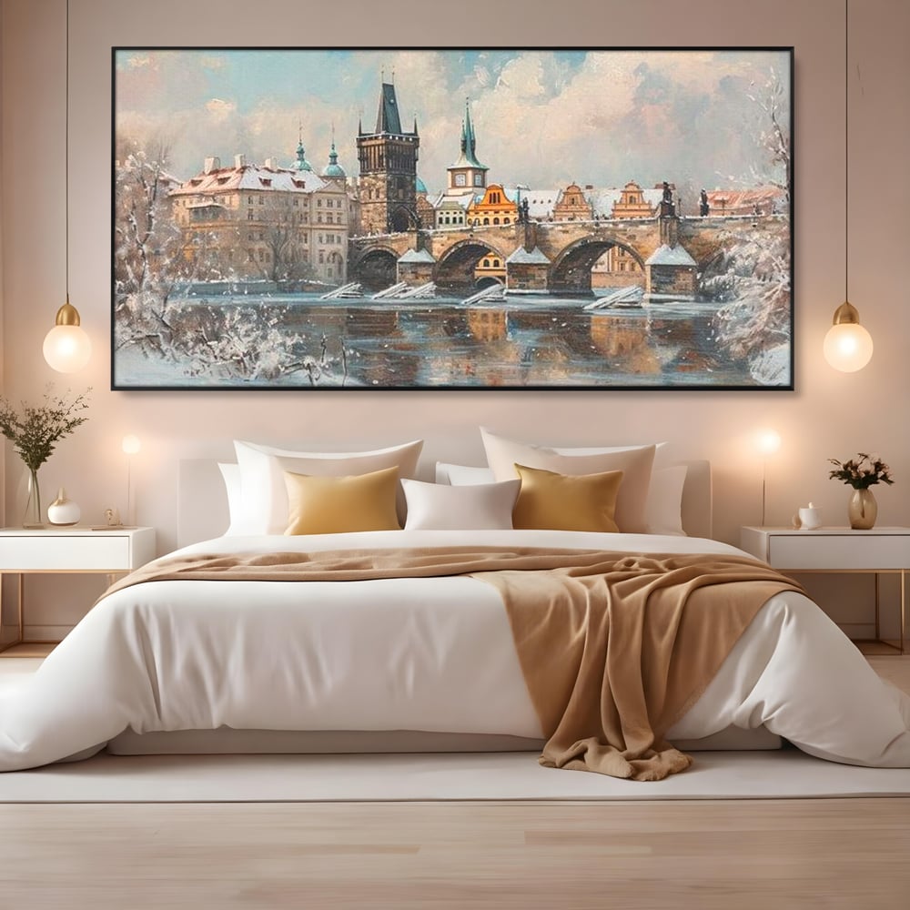 Tablou canvas cu pictura cu podul carol din praga iarna, in rama de aluminiu negru, pe perete intr-un dormitor