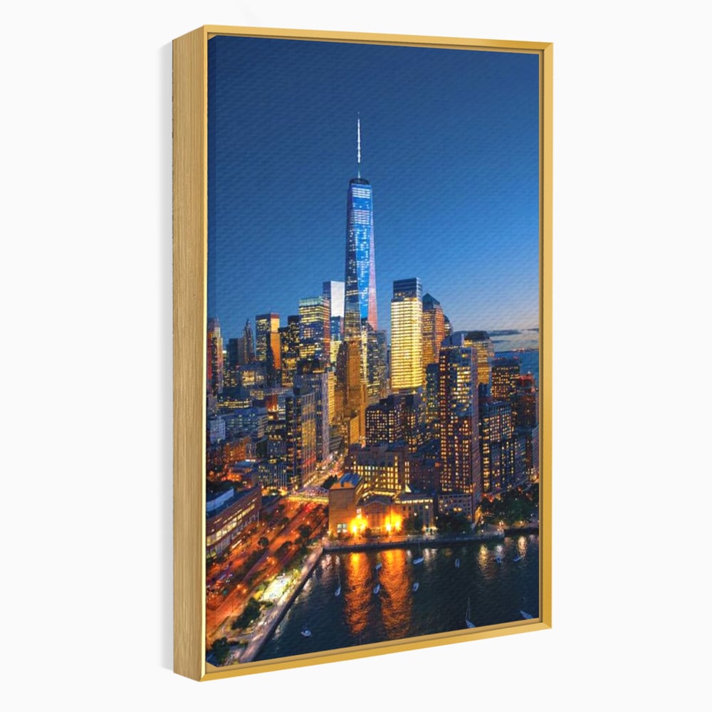 Tablou canvas cu panoramic nocturn cu zghiet-nori din new york, in rama de aluminiu auriu